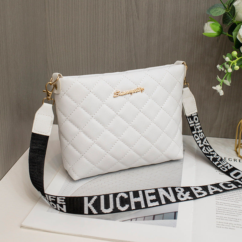 Zwart gewatteerd crossbody tasje met brede band