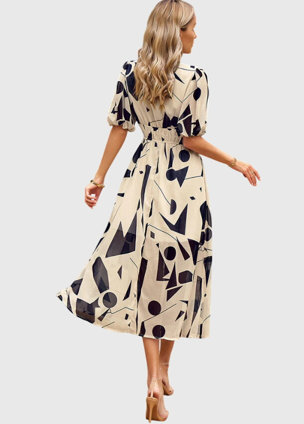 Merlin | Flatterende Bloemen Midi Jurk